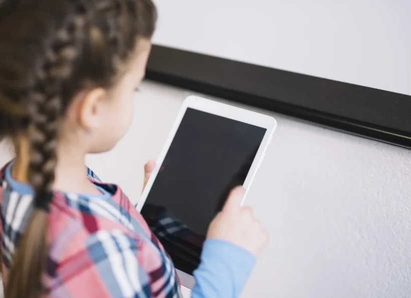 convertio.in_overhead-view-girl-using-digital-tablet